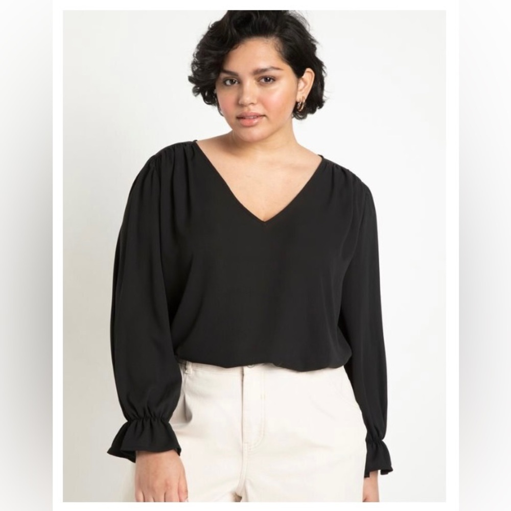 Black sheer blouse with wrist detail